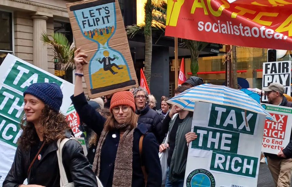 Protestors rally to tax the rich more and the working class less