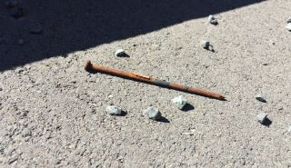 Rusted nail found under the boardwalk. Photo: Hele Ikimotu